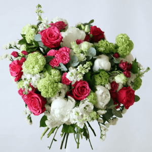 fuchia pink roses, white peonies and viburnum and stock bouquet