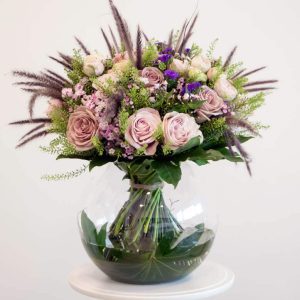 Pink and green bouquet in a vase