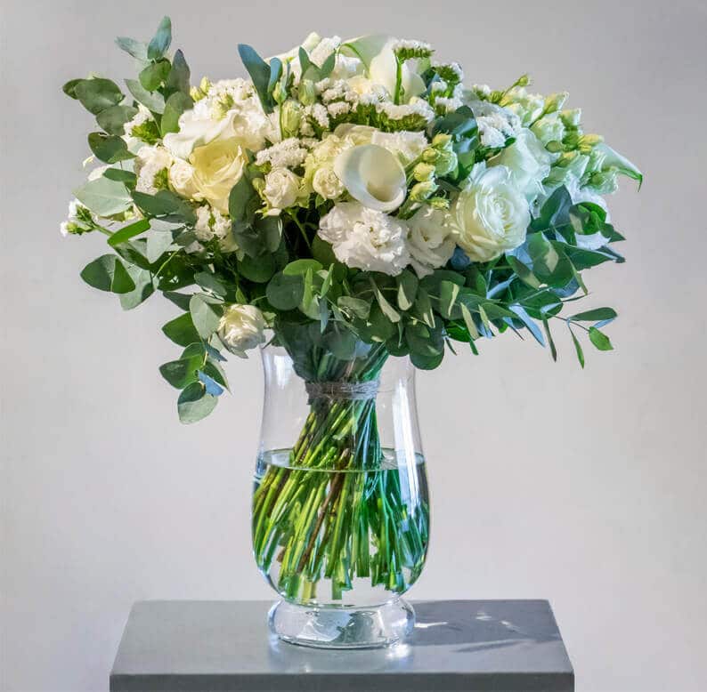 White and green bouquet in a vase