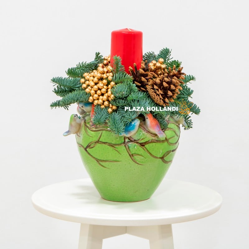 A beautiful festive arrangement with pot
