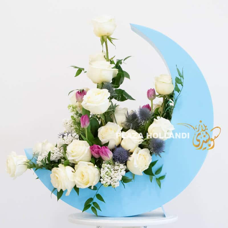 Blue crescent moon with white roses
