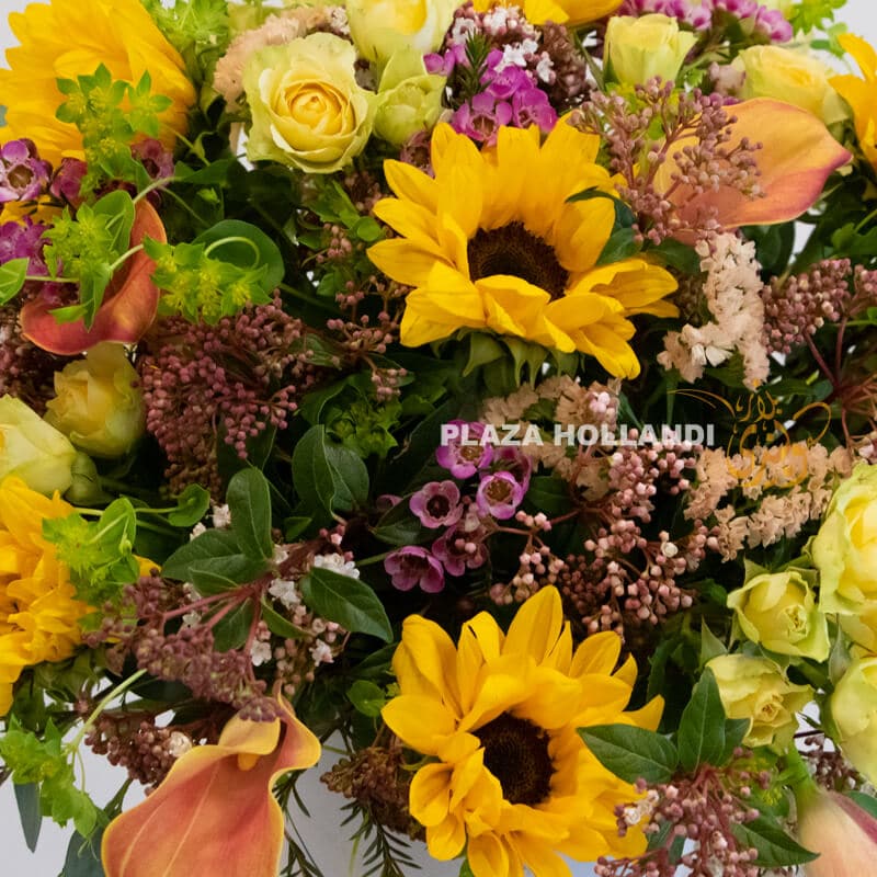 Close up of yellow and purple flower arrangement