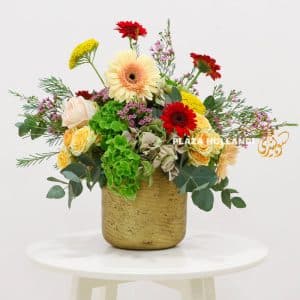 large gold pot with flowers
