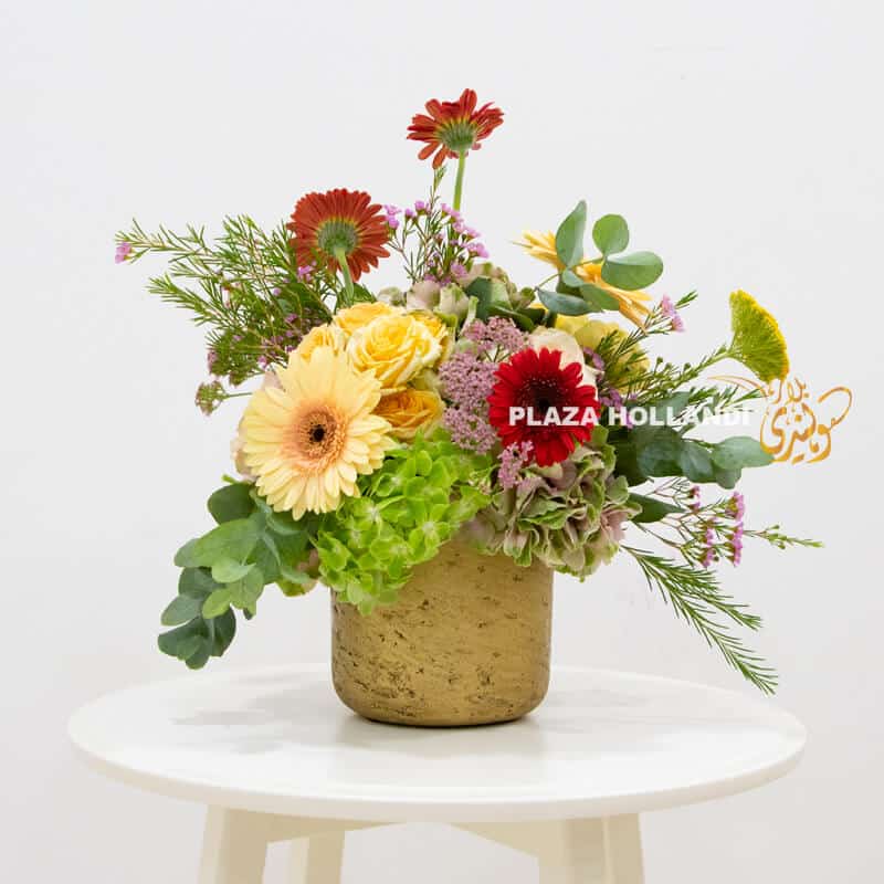 medium gold pot with flowers