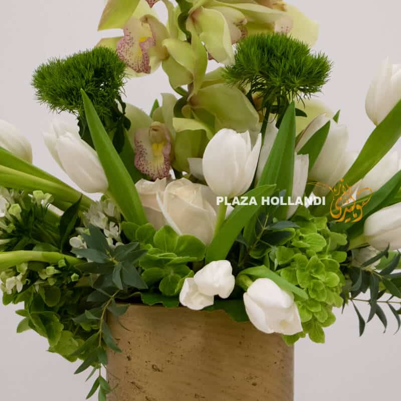 Clos eup of green and white flower arrangement