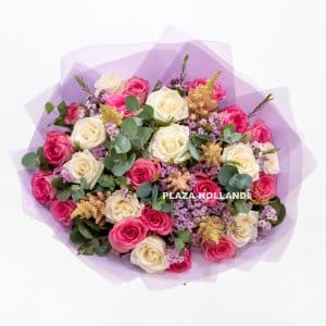 mixed pink roses bouquet with paper