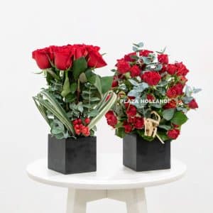 two red rose and spray rose flower arrangements