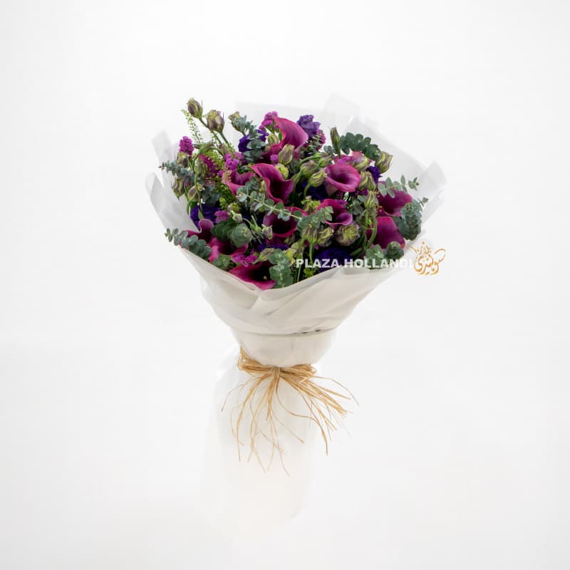 Bouquet of calla lily flowers and purple eustoma