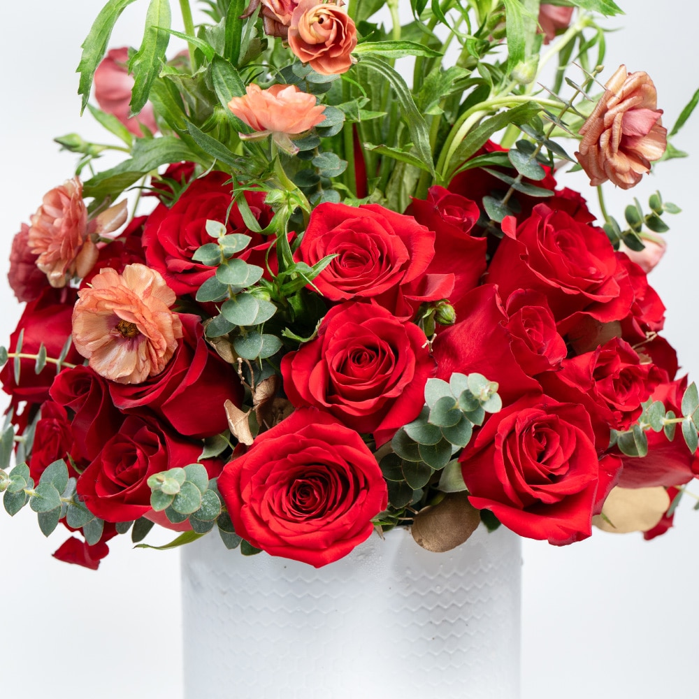 A21.1 White Pot Floral Display with Red Roses, Baby Roses & Eucalyptus