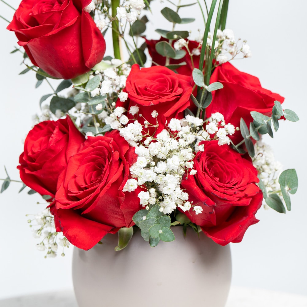 A22.1 Red Roses, Eucalyptus & Steel Grass in Stylish Pot - 30 cm Height