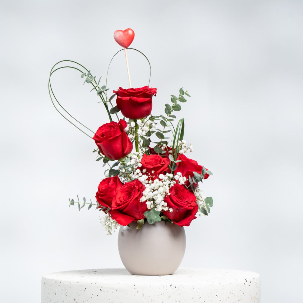 A22 Red Roses, Eucalyptus & Steel Grass in Stylish Pot - 30 cm Height