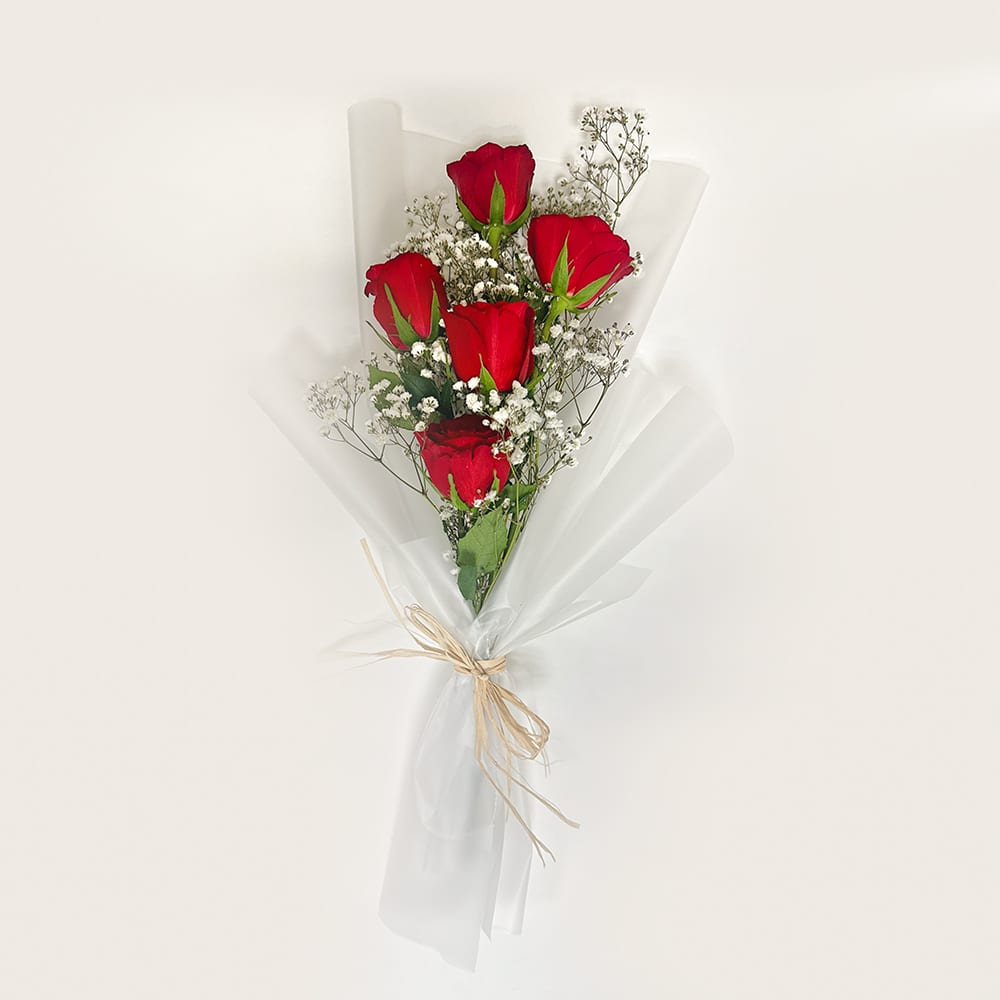 3 Red Rosed in white wrap