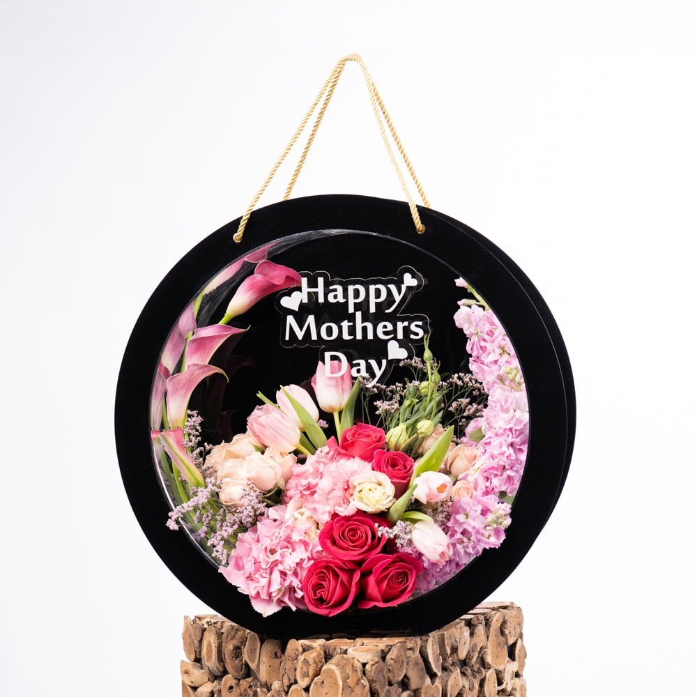DSC04282 "Stunning arrangement of Tulips, Calla Lilies, Hydrangea, Mattiola, Limonium, Eustoma, and Fuchsia Roses, offering a vibrant and elegant floral display."