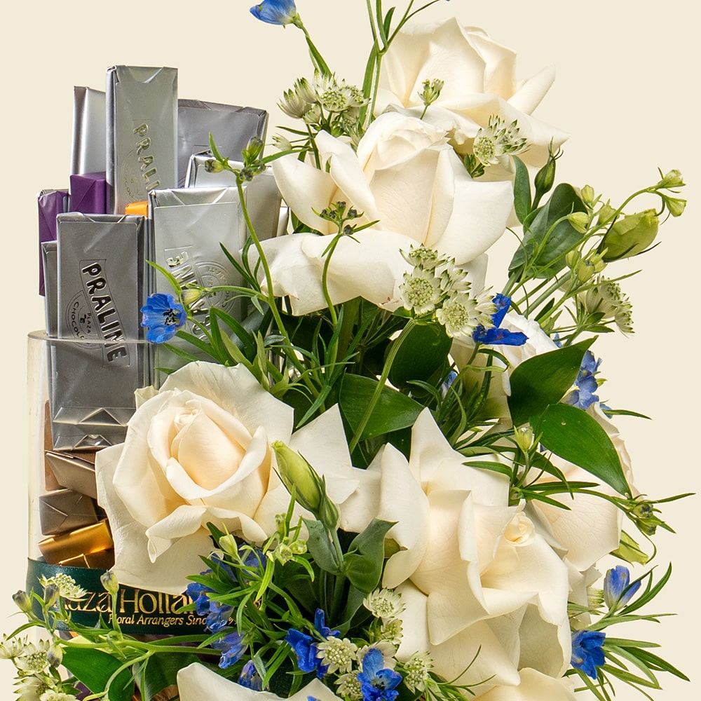 4.2 White roses and blue delphinium bouquet with chocolates