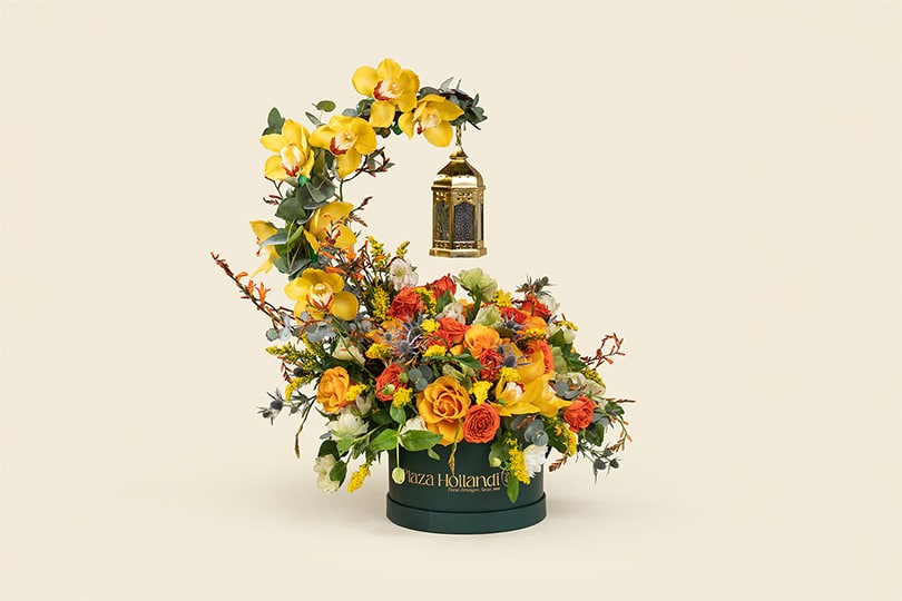 16-2-1.jpg Majestic Orchid Crescent Flower Arrangement with Lantern in Plaza Hollandi Box