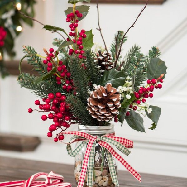 Mason jar with flowers Christmas mason jar filled with foliage